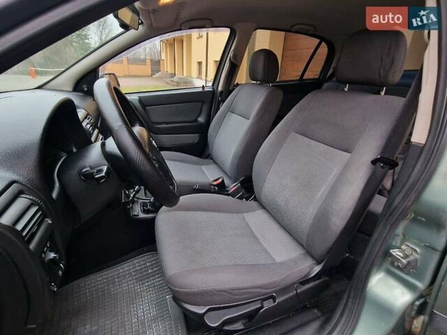 Зелений Опель Астра, об'ємом двигуна 1.36 л та пробігом 179 тис. км за 3000 $, фото 37 на Automoto.ua