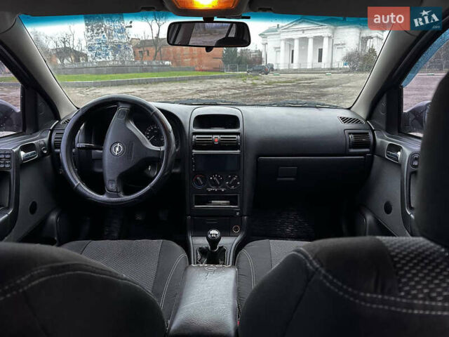 Зелений Опель Астра, об'ємом двигуна 1.36 л та пробігом 235 тис. км за 4000 $, фото 9 на Automoto.ua