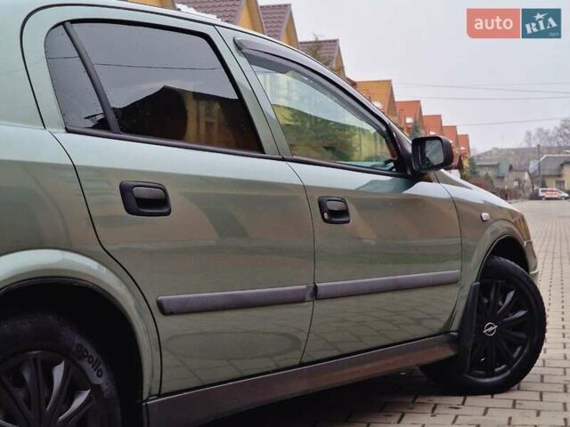 Зелений Опель Астра, об'ємом двигуна 1.36 л та пробігом 179 тис. км за 3000 $, фото 24 на Automoto.ua