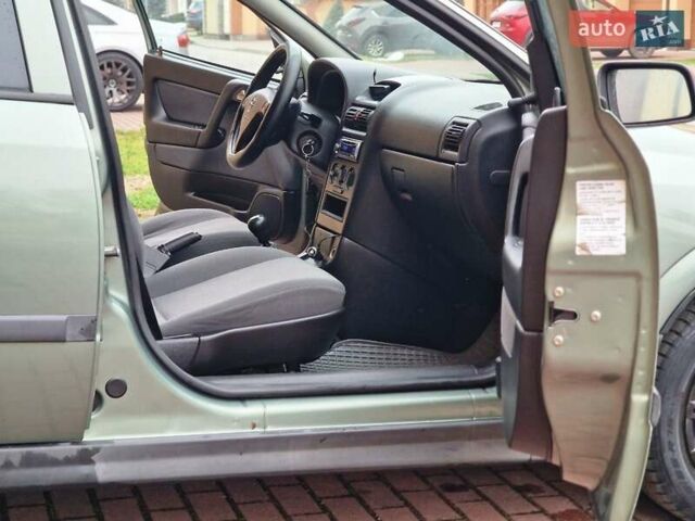 Зелений Опель Астра, об'ємом двигуна 1.36 л та пробігом 179 тис. км за 3000 $, фото 56 на Automoto.ua