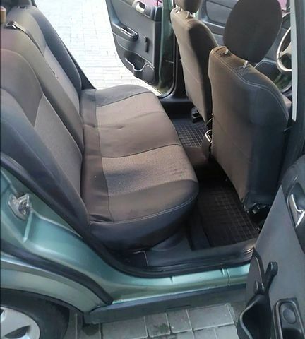 Зелений Опель Астра, об'ємом двигуна 1.4 л та пробігом 296 тис. км за 3400 $, фото 5 на Automoto.ua