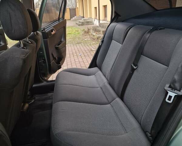 Зелений Опель Астра, об'ємом двигуна 1.36 л та пробігом 179 тис. км за 3000 $, фото 35 на Automoto.ua