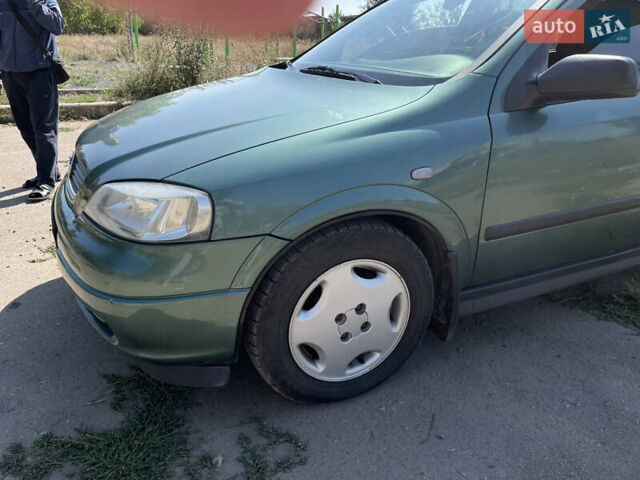 Зеленый Опель Астра, объемом двигателя 1.6 л и пробегом 166 тыс. км за 4300 $, фото 9 на Automoto.ua