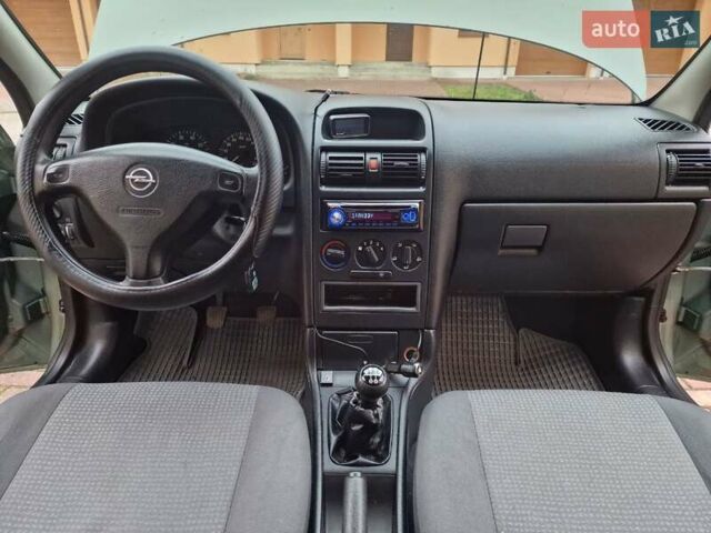 Зелений Опель Астра, об'ємом двигуна 1.36 л та пробігом 179 тис. км за 3000 $, фото 29 на Automoto.ua