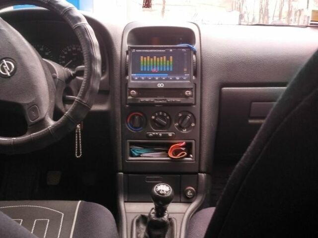 Опель Астра 2008 в Бердичеве на Automoto.ua Зеленый Опель Астра, объемом двигателя 1.6 л и пробегом 220 тыс. км за 3811 $, фото 9 на Automoto.ua