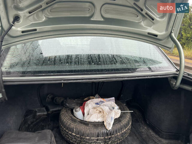 Зелений Опель Астра, об'ємом двигуна 1.36 л та пробігом 268 тис. км за 2599 $, фото 14 на Automoto.ua