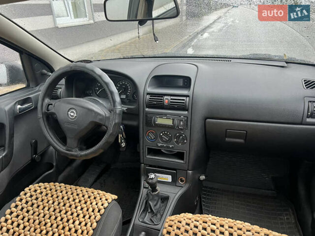 Зелений Опель Астра, об'ємом двигуна 1.36 л та пробігом 268 тис. км за 2599 $, фото 15 на Automoto.ua