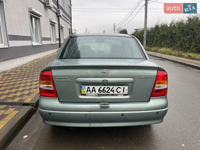 Зелений Опель Астра, об'ємом двигуна 1.36 л та пробігом 268 тис. км за 2599 $, фото 5 на Automoto.ua