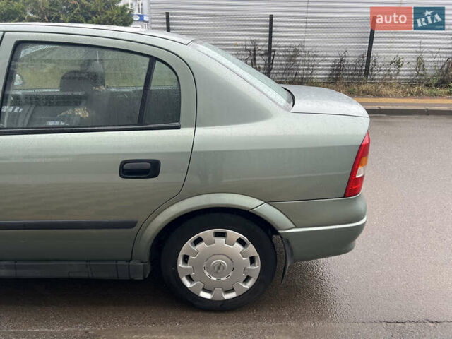 Зелений Опель Астра, об'ємом двигуна 1.36 л та пробігом 268 тис. км за 2599 $, фото 7 на Automoto.ua