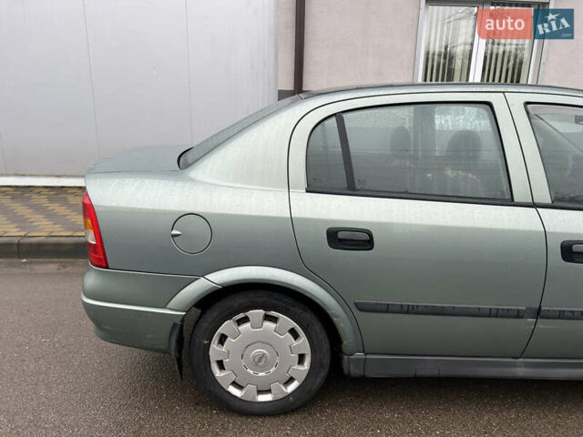 Зелений Опель Астра, об'ємом двигуна 1.36 л та пробігом 268 тис. км за 2599 $, фото 3 на Automoto.ua