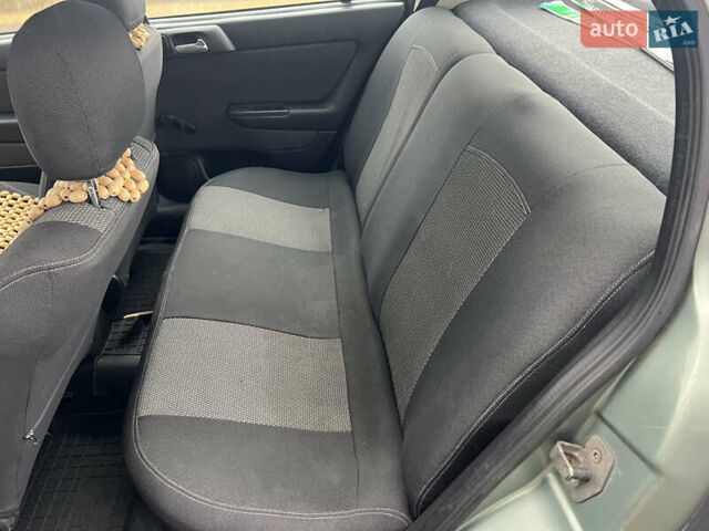 Зелений Опель Астра, об'ємом двигуна 1.36 л та пробігом 268 тис. км за 2599 $, фото 13 на Automoto.ua