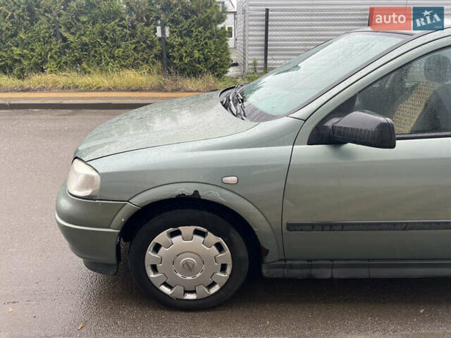 Зелений Опель Астра, об'ємом двигуна 1.36 л та пробігом 268 тис. км за 2599 $, фото 8 на Automoto.ua