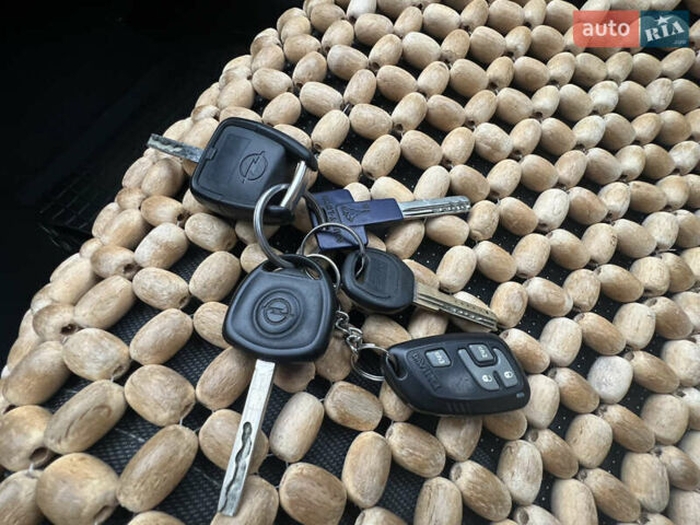 Зелений Опель Астра, об'ємом двигуна 1.36 л та пробігом 268 тис. км за 2599 $, фото 19 на Automoto.ua