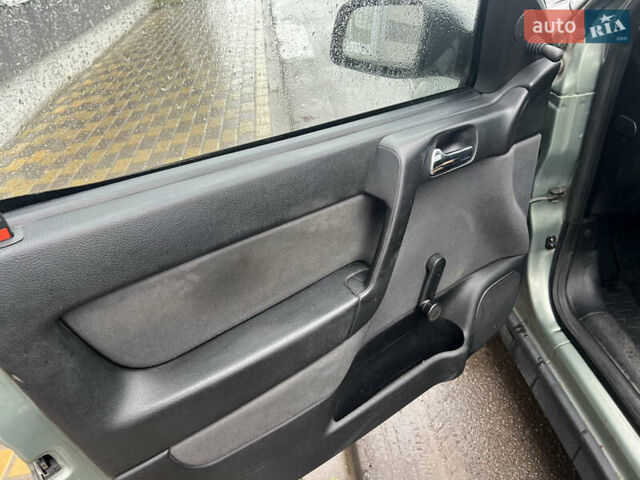 Зелений Опель Астра, об'ємом двигуна 1.36 л та пробігом 268 тис. км за 2599 $, фото 11 на Automoto.ua