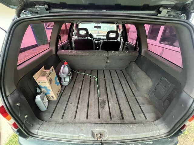 Зеленый Опель Астра, объемом двигателя 1.6 л и пробегом 351 тыс. км за 950 $, фото 5 на Automoto.ua