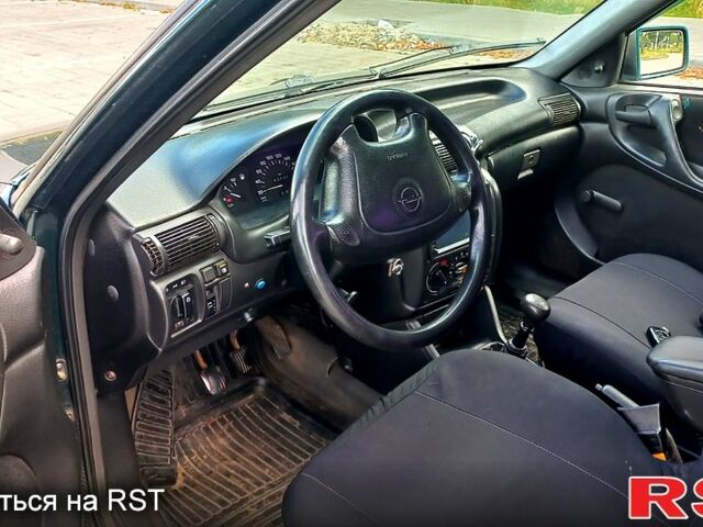 Зеленый Опель Астра, объемом двигателя 1.6 л и пробегом 280 тыс. км за 2500 $, фото 11 на Automoto.ua