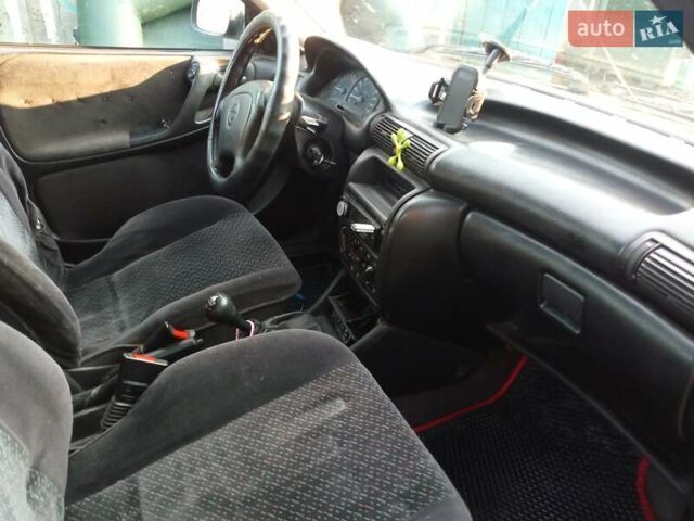 Зелений Опель Астра, об'ємом двигуна 1.39 л та пробігом 111 тис. км за 1808 $, фото 1 на Automoto.ua