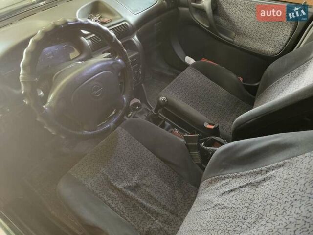 Зеленый Опель Астра, объемом двигателя 1.6 л и пробегом 330 тыс. км за 2200 $, фото 3 на Automoto.ua