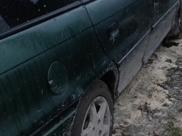 Зеленый Опель Астра, объемом двигателя 1.6 л и пробегом 360 тыс. км за 595 $, фото 1 на Automoto.ua