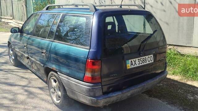 Зеленый Опель Астра, объемом двигателя 1.6 л и пробегом 258 тыс. км за 1450 $, фото 10 на Automoto.ua