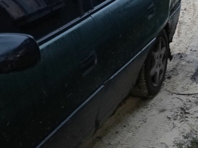 Зеленый Опель Астра, объемом двигателя 1.6 л и пробегом 360 тыс. км за 595 $, фото 2 на Automoto.ua