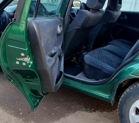 Зелений Опель Астра, об'ємом двигуна 1.8 л та пробігом 415 тис. км за 2300 $, фото 8 на Automoto.ua
