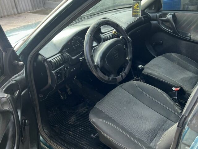 Опель Астра 1997 в Томаковка на Automoto.ua Зеленый Опель Астра, объемом двигателя 1.6 л и пробегом 170 тыс. км за 879 $, фото 6 на Automoto.ua