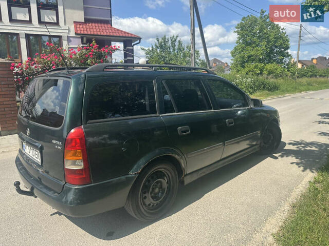 Зеленый Опель Астра, объемом двигателя 2 л и пробегом 234 тыс. км за 1750 $, фото 14 на Automoto.ua