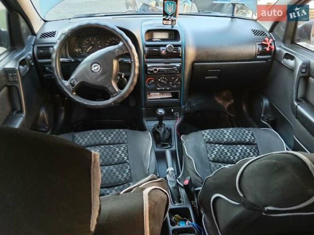 Зеленый Опель Астра, объемом двигателя 1.39 л и пробегом 132 тыс. км за 3500 $, фото 2 на Automoto.ua