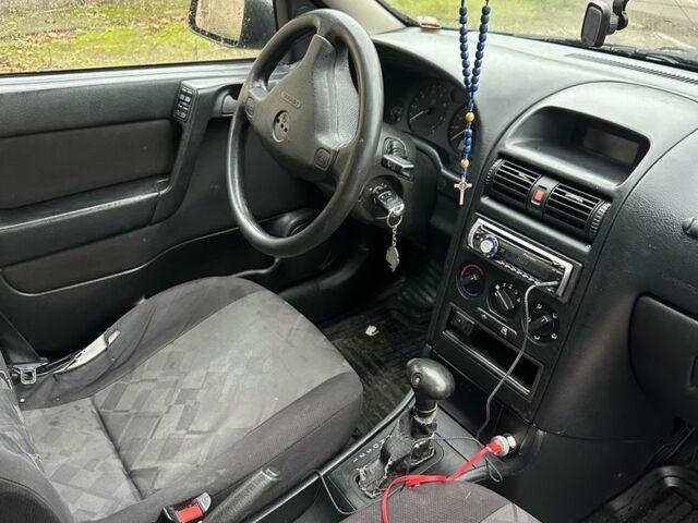 Зелений Опель Астра, об'ємом двигуна 1.6 л та пробігом 320 тис. км за 2499 $, фото 6 на Automoto.ua