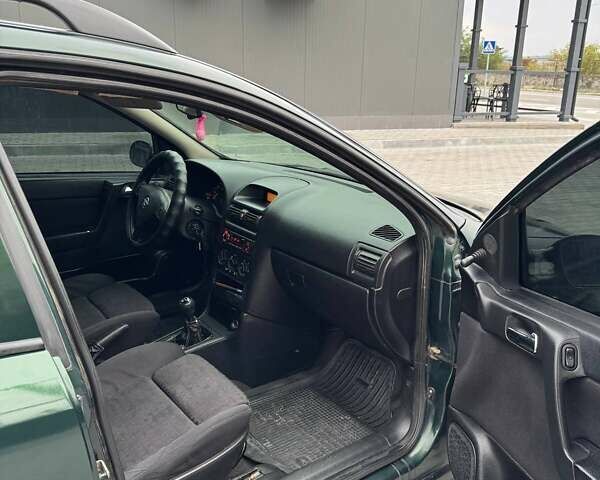 Зеленый Опель Астра, объемом двигателя 1.6 л и пробегом 265 тыс. км за 2150 $, фото 14 на Automoto.ua