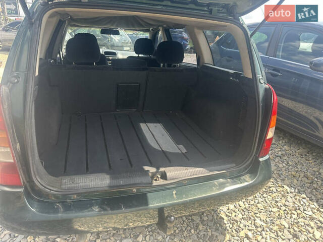 Зеленый Опель Астра, объемом двигателя 2 л и пробегом 200 тыс. км за 1690 $, фото 21 на Automoto.ua