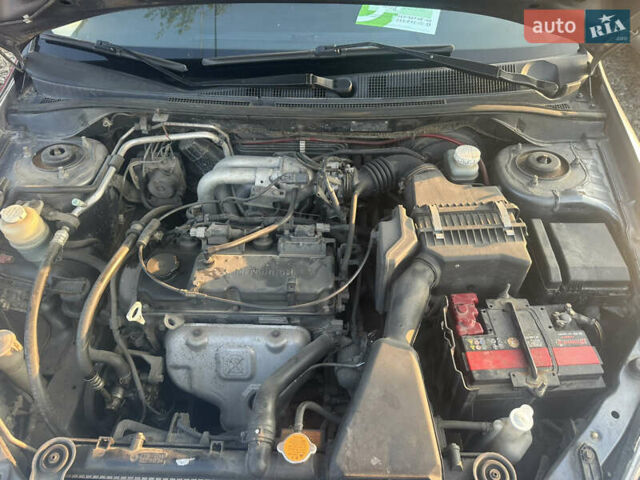 Зеленый Опель Астра, объемом двигателя 2 л и пробегом 200 тыс. км за 1690 $, фото 24 на Automoto.ua