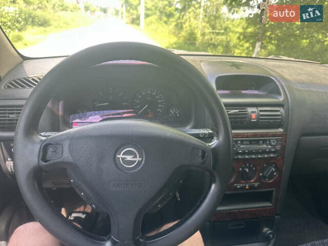 Зеленый Опель Астра, объемом двигателя 2 л и пробегом 200 тыс. км за 1690 $, фото 18 на Automoto.ua