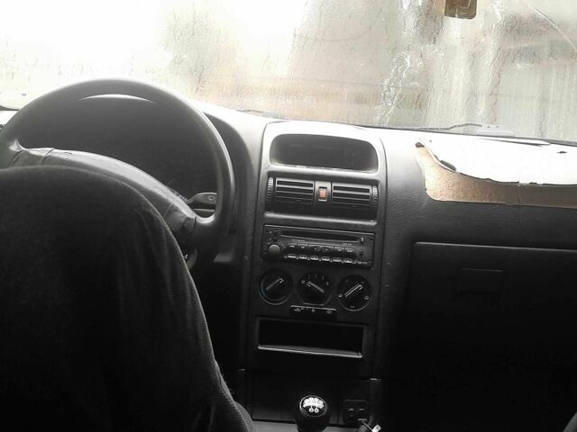 Зеленый Опель Астра, объемом двигателя 1.6 л и пробегом 350 тыс. км за 1001 $, фото 3 на Automoto.ua