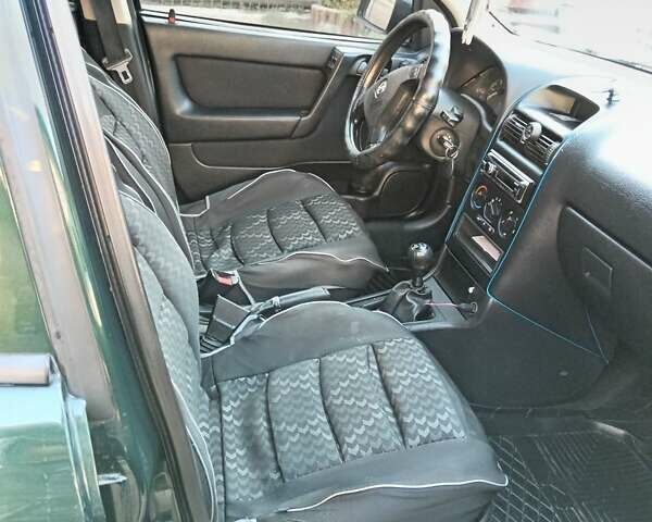 Зеленый Опель Астра, объемом двигателя 1.39 л и пробегом 132 тыс. км за 3500 $, фото 1 на Automoto.ua