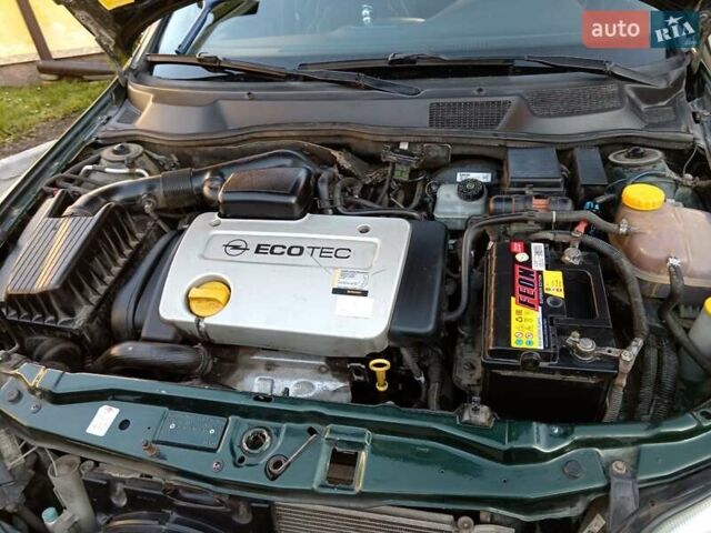 Зеленый Опель Астра, объемом двигателя 1.39 л и пробегом 132 тыс. км за 3500 $, фото 7 на Automoto.ua