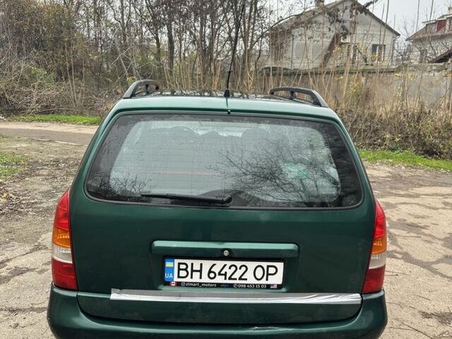 Зелений Опель Астра, об'ємом двигуна 1.6 л та пробігом 320 тис. км за 2499 $, фото 3 на Automoto.ua
