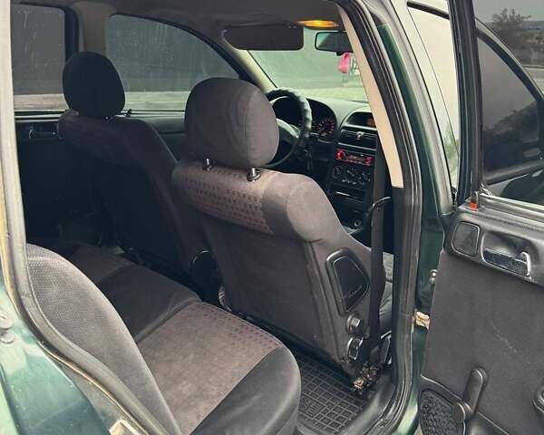 Зеленый Опель Астра, объемом двигателя 1.6 л и пробегом 265 тыс. км за 2150 $, фото 13 на Automoto.ua