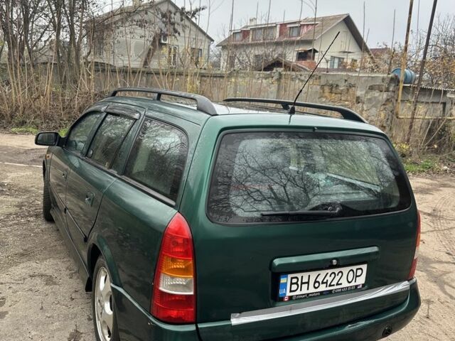 Зелений Опель Астра, об'ємом двигуна 1.6 л та пробігом 320 тис. км за 2499 $, фото 4 на Automoto.ua