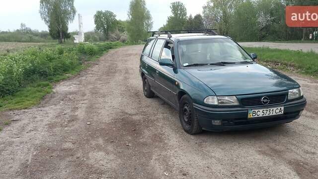 Зеленый Опель Астра, объемом двигателя 1.6 л и пробегом 336 тыс. км за 1750 $, фото 1 на Automoto.ua