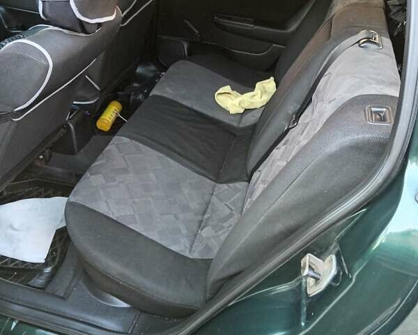 Зеленый Опель Астра, объемом двигателя 1.39 л и пробегом 132 тыс. км за 3500 $, фото 5 на Automoto.ua