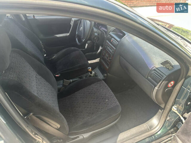 Зеленый Опель Астра, объемом двигателя 2 л и пробегом 200 тыс. км за 1690 $, фото 12 на Automoto.ua