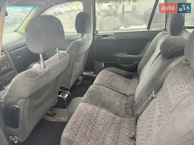 Зеленый Опель Астра, объемом двигателя 1.6 л и пробегом 250 тыс. км за 2350 $, фото 20 на Automoto.ua