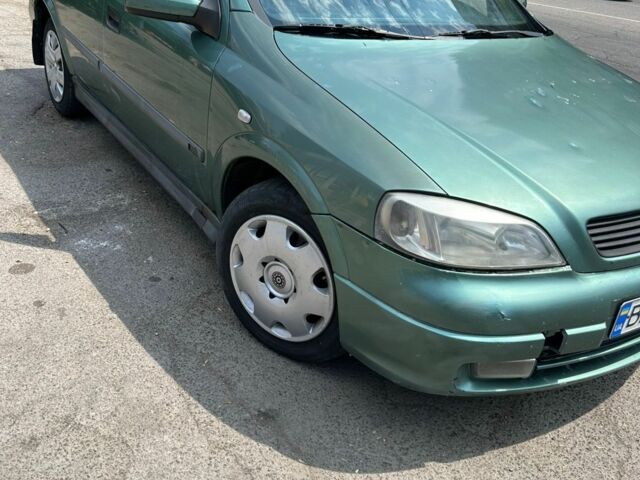 Зеленый Опель Астра, объемом двигателя 1.6 л и пробегом 250 тыс. км за 2100 $, фото 2 на Automoto.ua