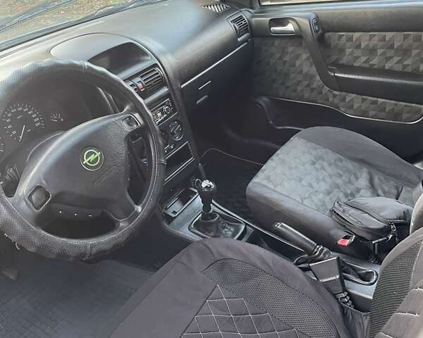 Зеленый Опель Астра, объемом двигателя 1.6 л и пробегом 227 тыс. км за 2100 $, фото 7 на Automoto.ua