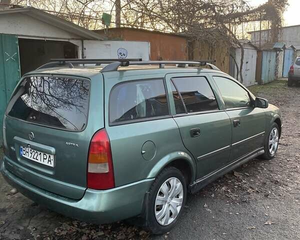 Зеленый Опель Астра, объемом двигателя 1.6 л и пробегом 227 тыс. км за 2100 $, фото 4 на Automoto.ua