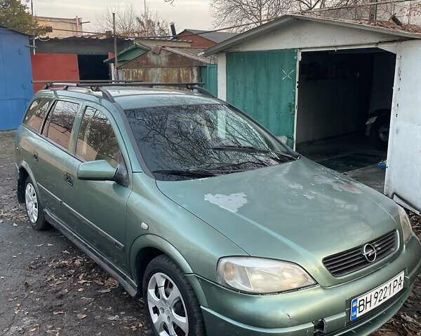 Зеленый Опель Астра, объемом двигателя 1.6 л и пробегом 227 тыс. км за 2100 $, фото 1 на Automoto.ua
