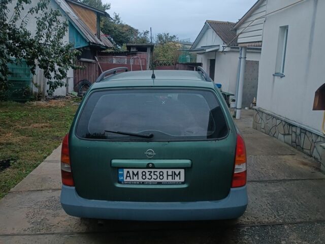 Зеленый Опель Астра, объемом двигателя 1.7 л и пробегом 420 тыс. км за 2800 $, фото 3 на Automoto.ua