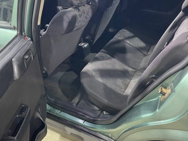 Зеленый Опель Астра, объемом двигателя 1.6 л и пробегом 250 тыс. км за 1150 $, фото 4 на Automoto.ua